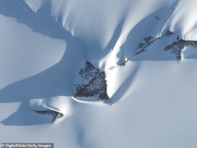 A pyramid-like mountain in Antarctica's Ellsworth Mountains (center) became internet-famous for its symmetry. Geologists say such forms result from natural erosion, not human construction (Antarctica 'pyramid': The strangely symmetrical mountain that sparked a major alien conspiracy theory | Live Science) (Antarctica 'pyramid': The strangely symmetrical mountain that sparked a major alien conspiracy theory | Live Science).