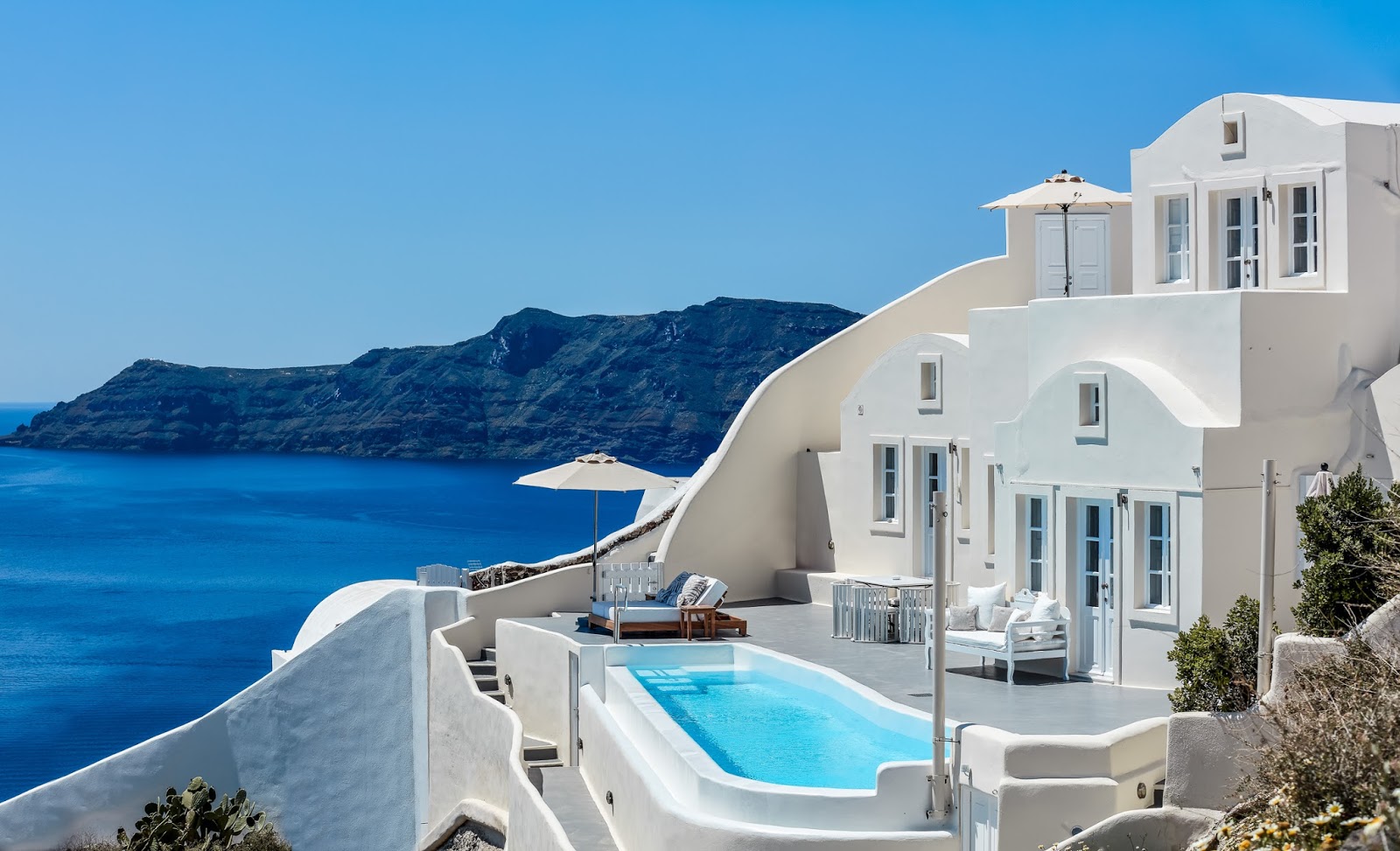 The Timeless Beauty and Practical Benefits of Santorini’s Houses